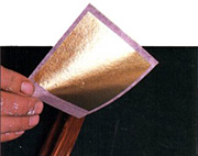 applicazione della foglia d'oro a decalco